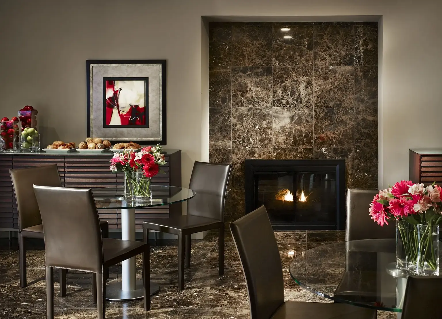 AVE Blue Bell Villas café with dark marble accents and bistro tables