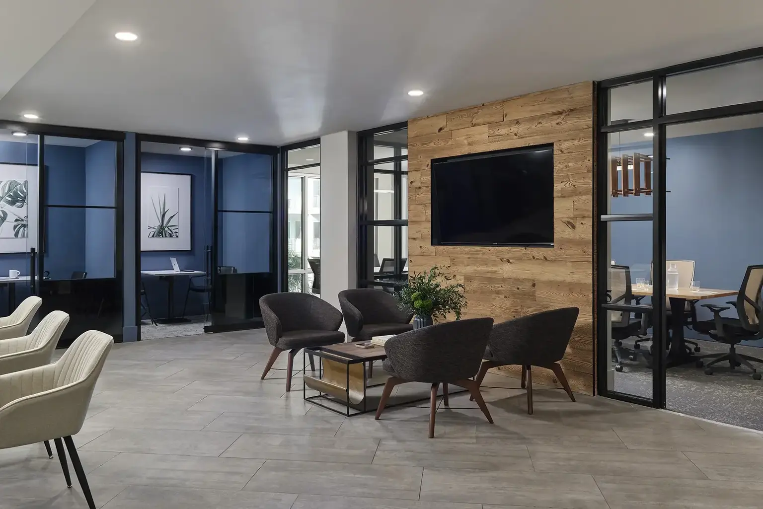 AVE Tampa Riverwalk Business center with private offices, private conference room, and common area with armchairs