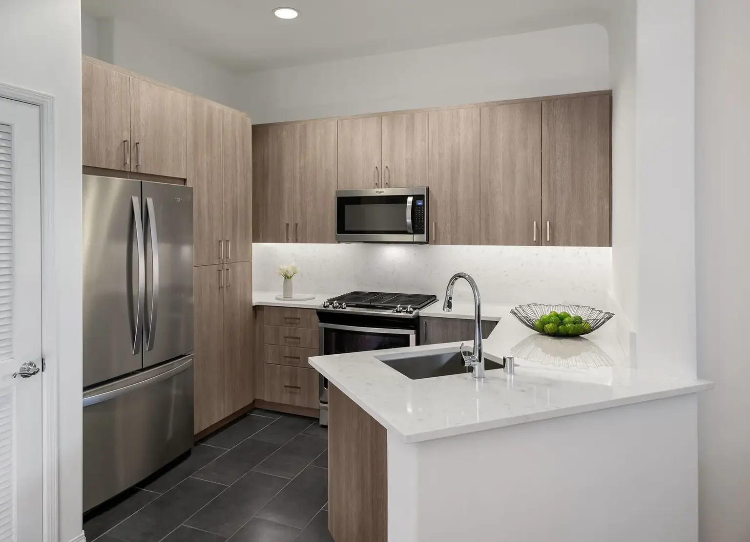 AKA Beverly Hills townhouse kitchen with wooden cabinets