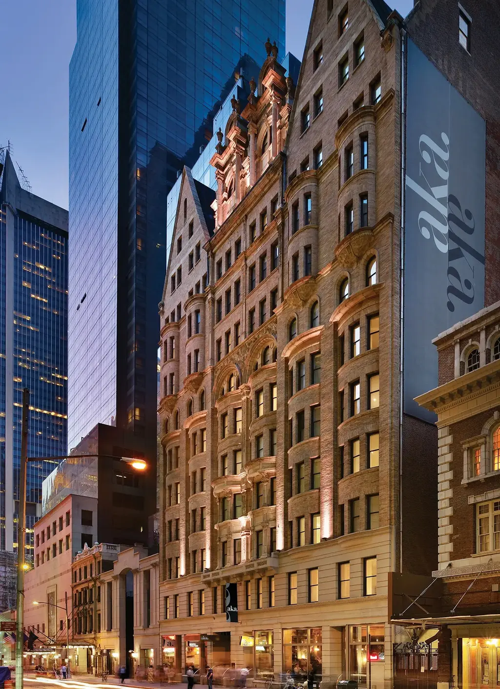 AKA Times Square Exterior facade with a large AKA banner on the side